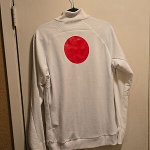 Nike Men's White Performance Jacket with Red Accents Japan Symbol.